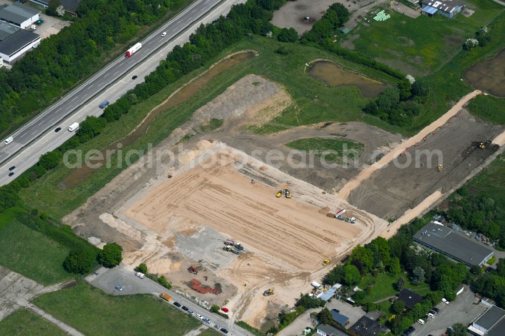 Aerial photograph Lübeck - Construction site for the construction of a building materials trade and logistics center in Luebeck in the state of Schleswig-Holstein, Germany