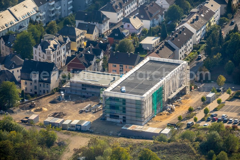 Aerial photograph Siegen - Construction site for the new building of Bildungsinstitut fuer Gesundheitsberufe in Suedwestfalen in Siegen in the state North Rhine-Westphalia, Germany