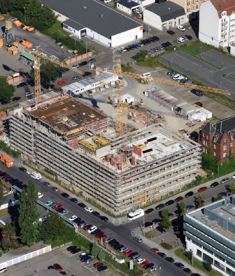 Dresden from the bird's eye view: Construction site of the WOLFF & MUeLLER Holding GmbH & Co. KG for the new building des Biotech-Gruenderzentrum in the street Tatzberg in Dresden in the state Saxony