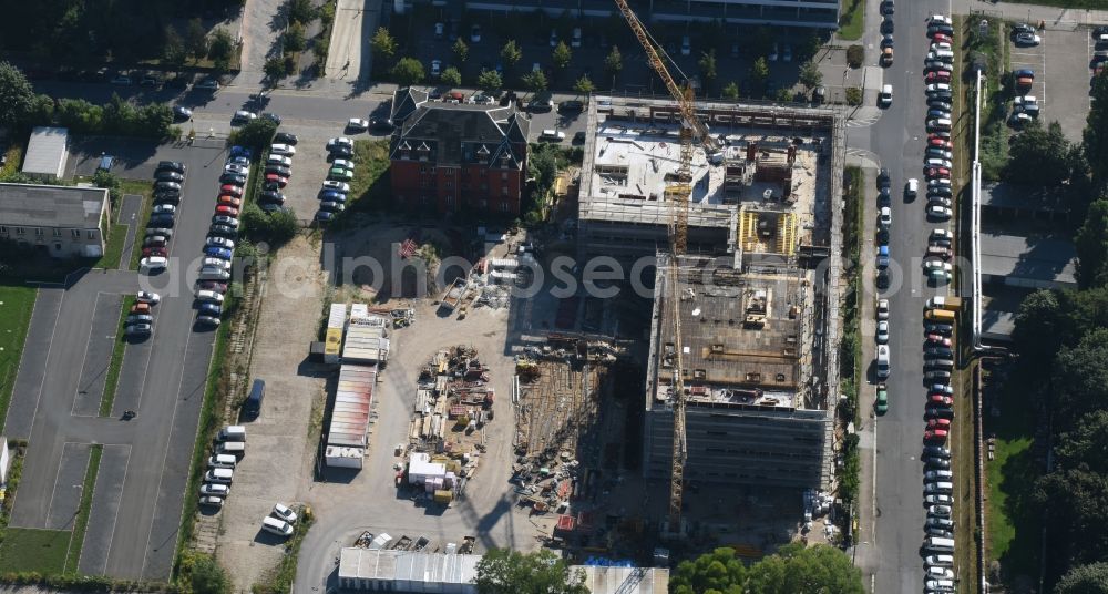 Aerial photograph Dresden - Construction site of the WOLFF & MUeLLER Holding GmbH & Co. KG for the new building des Biotech-Gruenderzentrum in the street Tatzberg in Dresden in the state Saxony