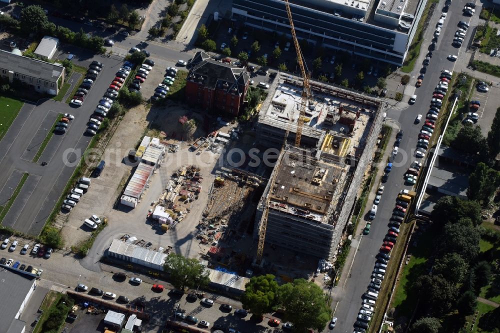 Dresden from above - Construction site of the WOLFF & MUeLLER Holding GmbH & Co. KG for the new building des Biotech-Gruenderzentrum in the street Tatzberg in Dresden in the state Saxony