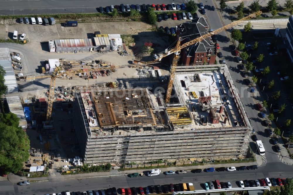 Aerial image Dresden - Construction site of the WOLFF & MUeLLER Holding GmbH & Co. KG for the new building des Biotech-Gruenderzentrum in the street Tatzberg in Dresden in the state Saxony