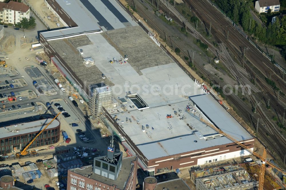 Braunschweig from the bird's eye view: Construction site for the new building BraWoPark in Braunschweig in the state of Lower Saxony. The new quarter of Volksbank BraWo will include office complexes, stores and a hotel