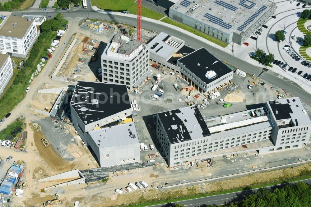 Aerial image Wetzlar - Construction site to build a new office and commercial building ensemble Leitz-Park 3. of Leitz-Park GmbH Am Leitz-Park - Auf of Plank in Wetzlar in the state Hesse, Germany