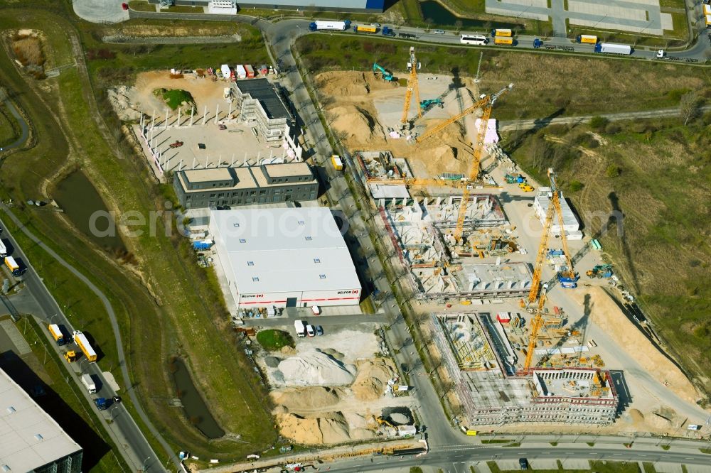 Aerial photograph Schönefeld - Construction site for the new building of an office building - ensemble on Mizarstrasse in Schoenefeld in the state Brandenburg, Germany