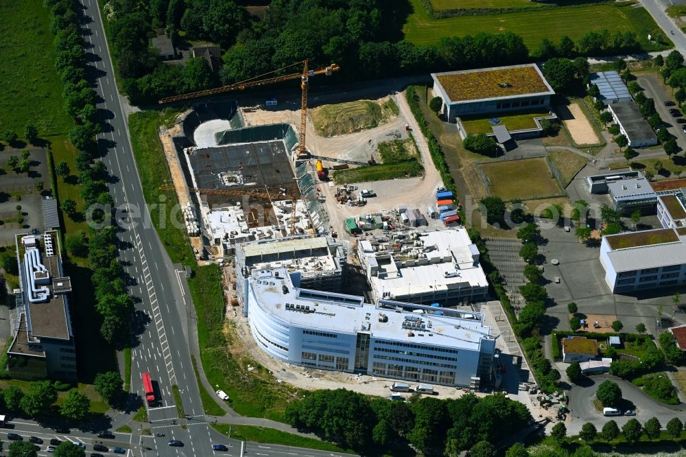 Paderborn from the bird's eye view: Construction site for the new building of an Office building - Ensemble of the Westend-Carree on Heinz-Nixdorf-Ring corner Paderborner Strasse in Paderborn in the state North Rhine-Westphalia, Germany