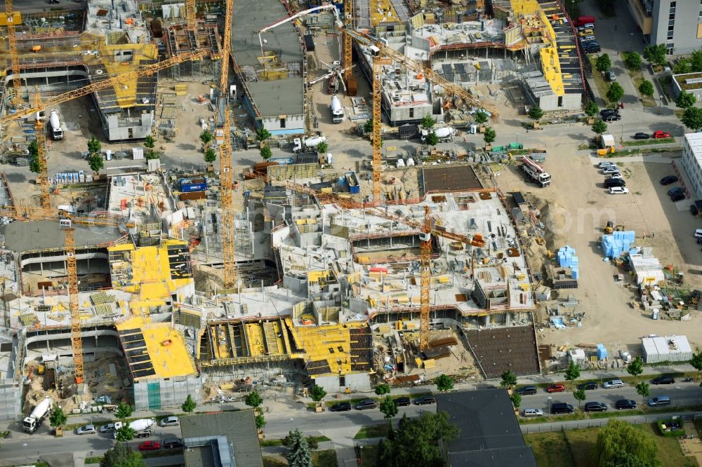 Berlin from the bird's eye view: Construction site to build a new office and commercial building Allianz Campus Berlin in the district Johannisthal - Adlershof in Berlin