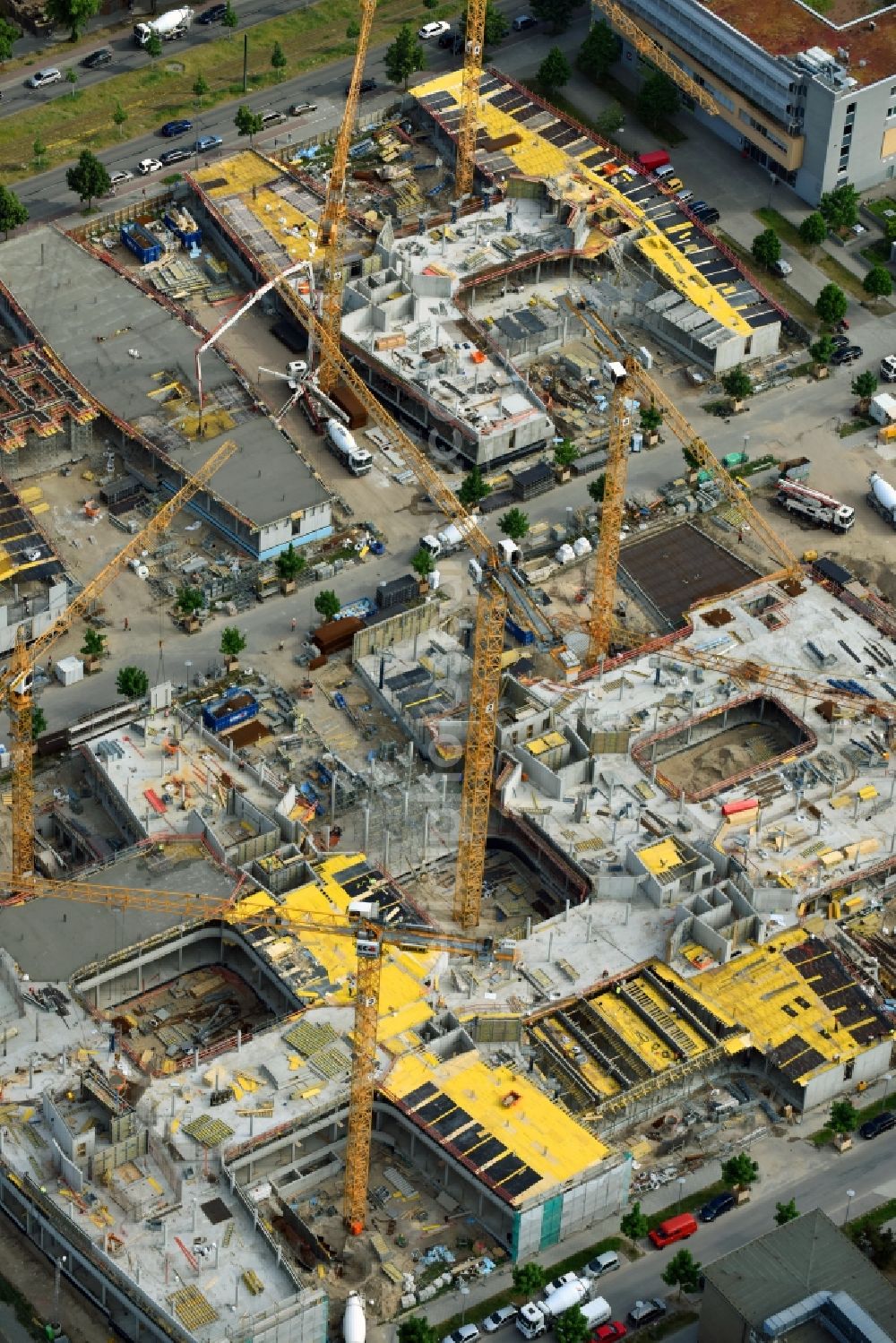 Berlin from the bird's eye view: Construction site to build a new office and commercial building Allianz Campus Berlin in the district Johannisthal - Adlershof in Berlin