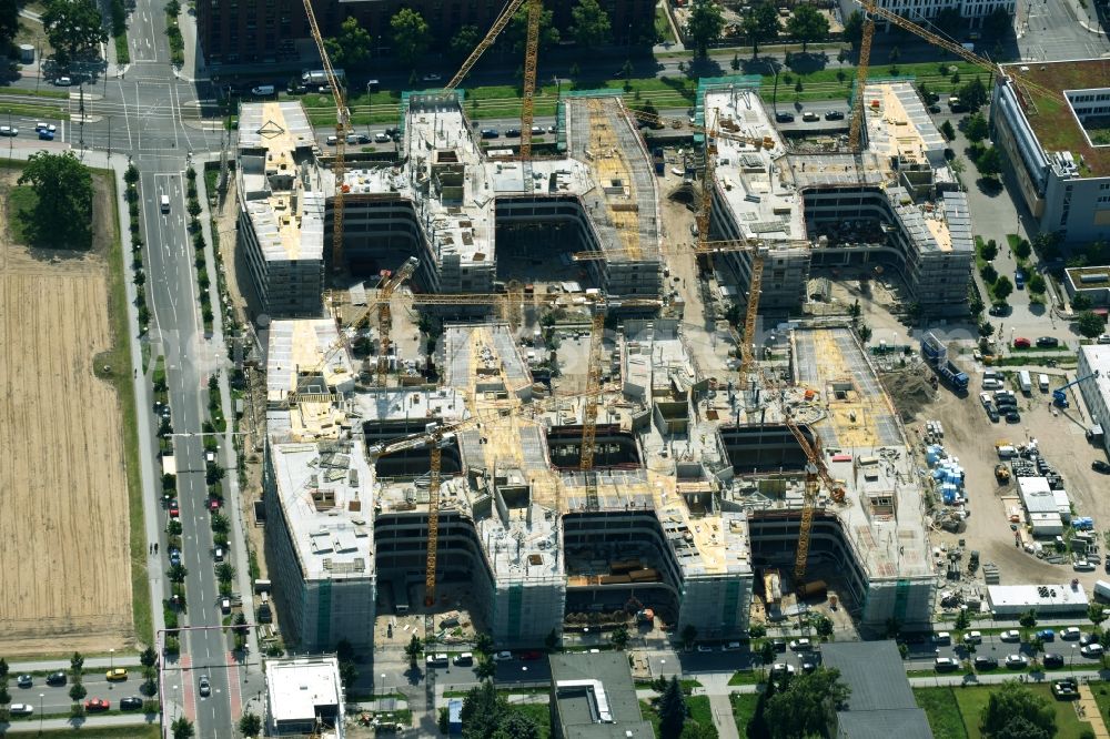 Berlin from the bird's eye view: Construction site to build a new office and commercial building Allianz Campus Berlin in the district Johannisthal - Adlershof in Berlin