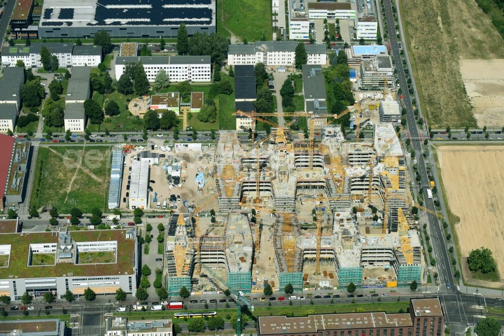 Berlin from the bird's eye view: Construction site to build a new office and commercial building Allianz Campus Berlin in the district Johannisthal - Adlershof in Berlin