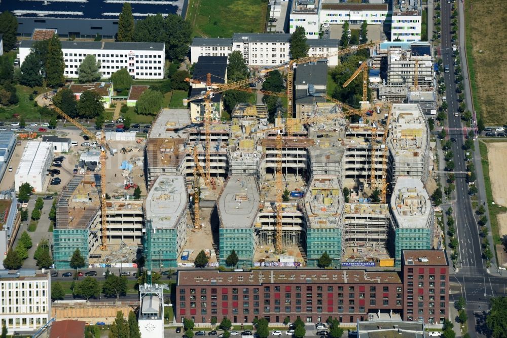 Berlin from the bird's eye view: Construction site to build a new office and commercial building Allianz Campus Berlin in the district Johannisthal - Adlershof in Berlin