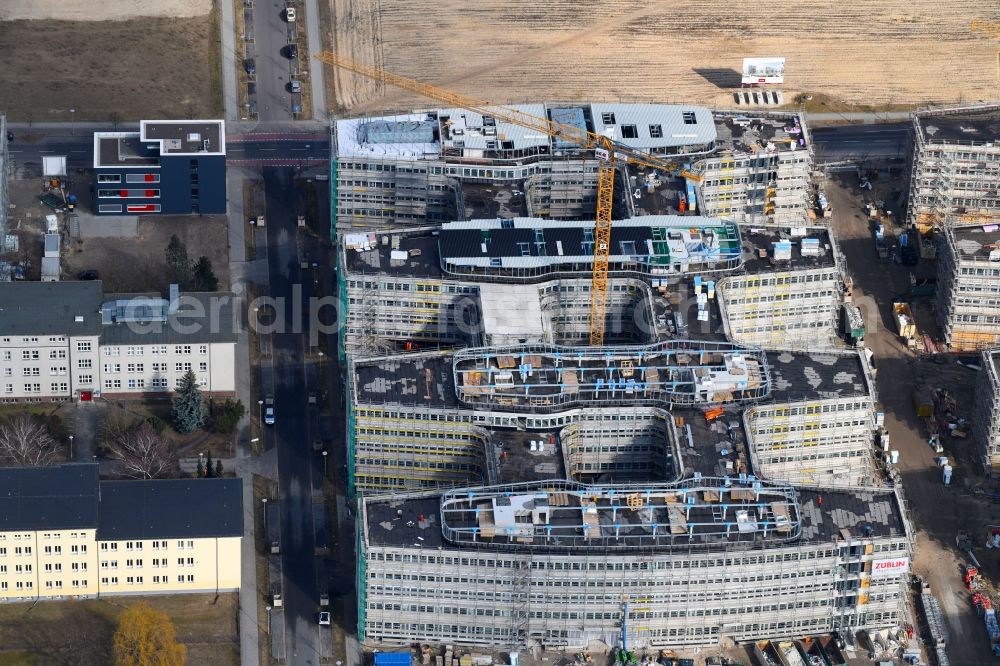 Berlin from the bird's eye view: Construction site to build a new office and commercial building Allianz Campus Berlin in the district Johannisthal - Adlershof in Berlin