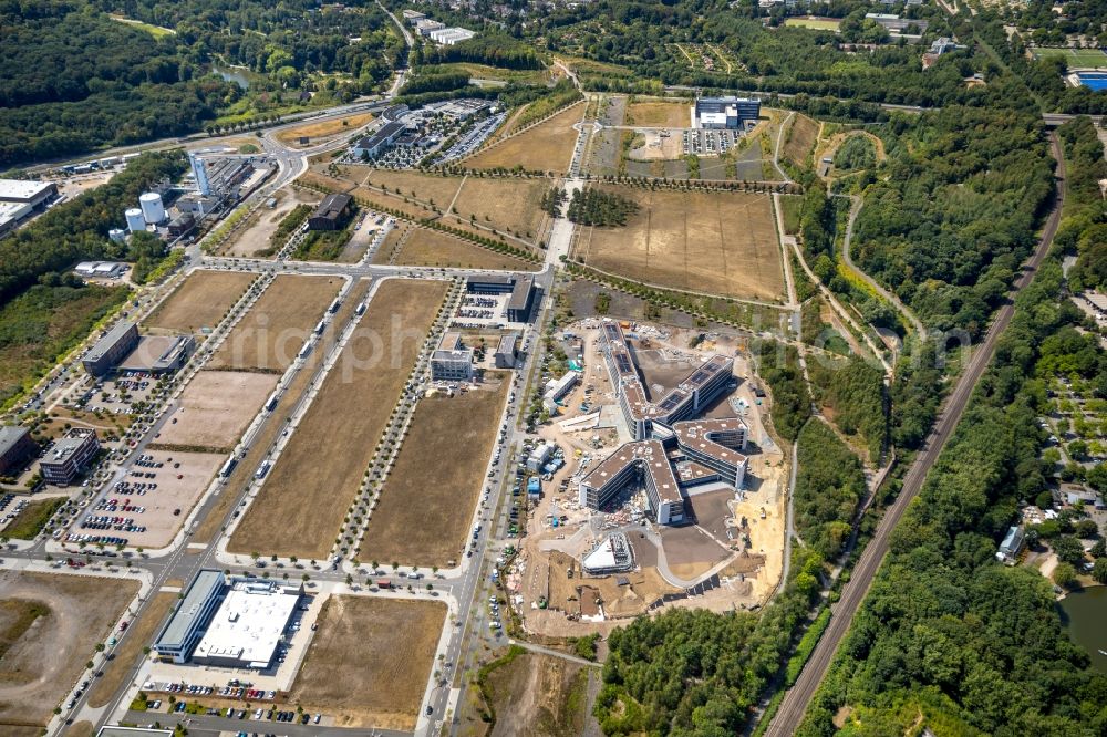 Dortmund from the bird's eye view: Construction site to build a new office and commercial building of Amprion GmbH on Robert-Schuman-Strasse in the district Hoerde in Dortmund in the state North Rhine-Westphalia