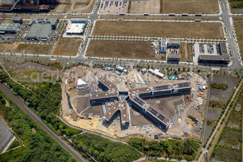 Aerial photograph Dortmund - Construction site to build a new office and commercial building of Amprion GmbH on Robert-Schuman-Strasse in the district Hoerde in Dortmund in the state North Rhine-Westphalia