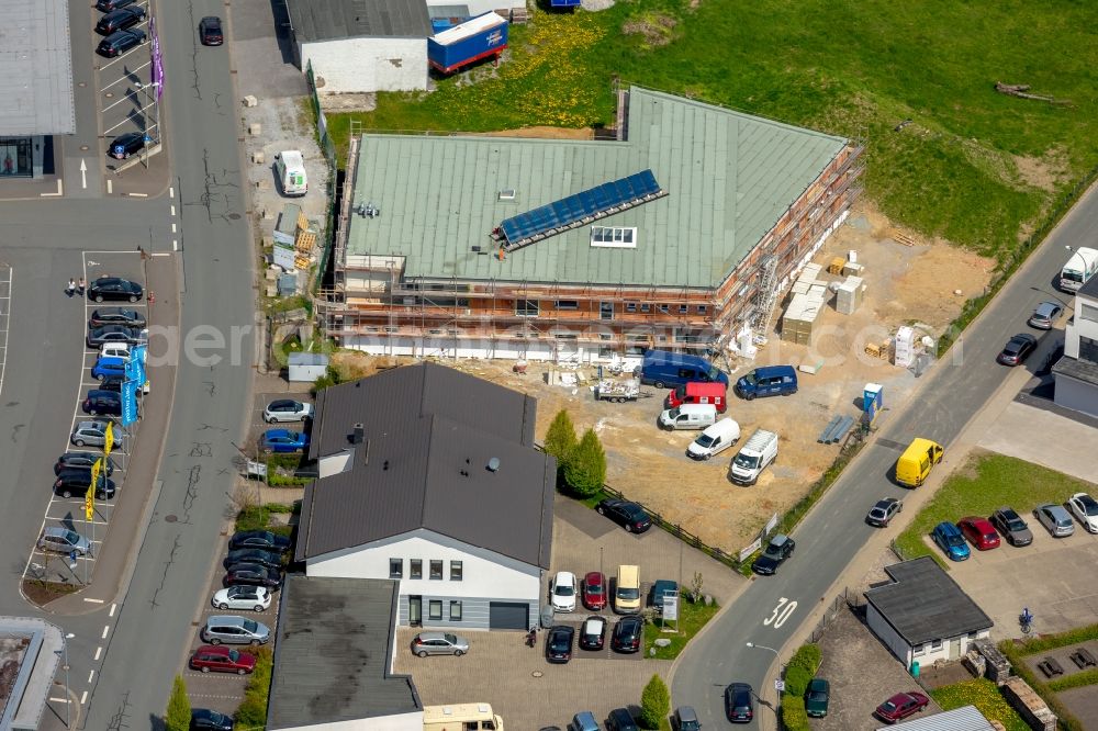 Aerial photograph Brilon - Construction site to build a new office and commercial building on Freiladestrasse - Papestrasse in Brilon in the state North Rhine-Westphalia