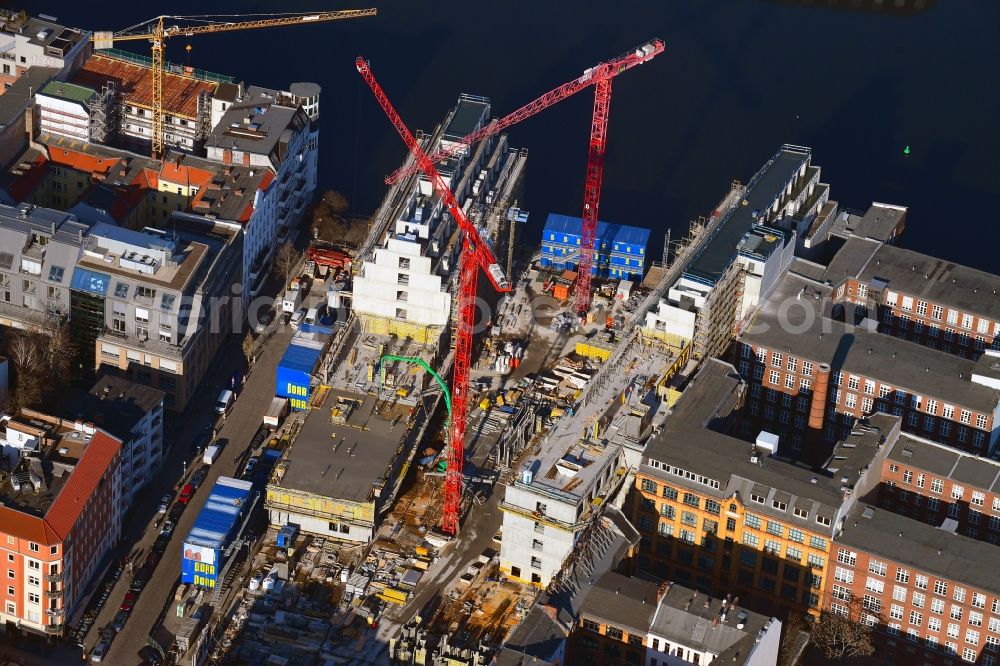 Berlin from the bird's eye view: Construction site to build a new office and commercial building CUVRY CAMPUS on Cuvrystrasse - Schlesische Strasse in the district Kreuzberg in Berlin, Germany