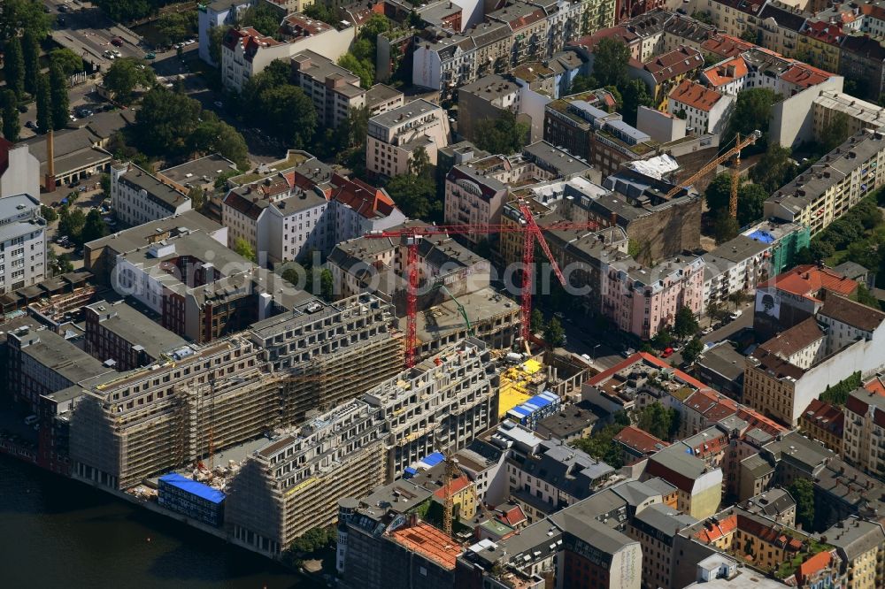 Berlin from the bird's eye view: Construction site to build a new office and commercial building CUVRY CAMPUS on Cuvrystrasse - Schlesische Strasse in the district Kreuzberg in Berlin, Germany