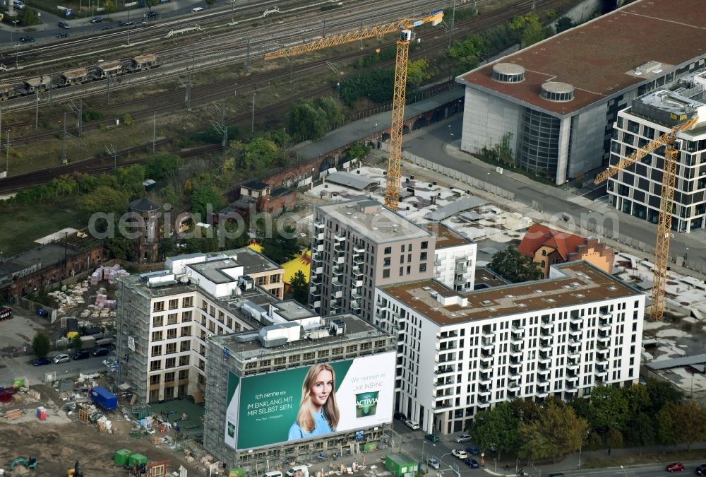 Aerial photograph Berlin - Construction site to build a new office and commercial building durch die BAM Deutschland AG an der Muehlenstrasse - Am Postbahnhof destrict Friedrichshain in Berlin