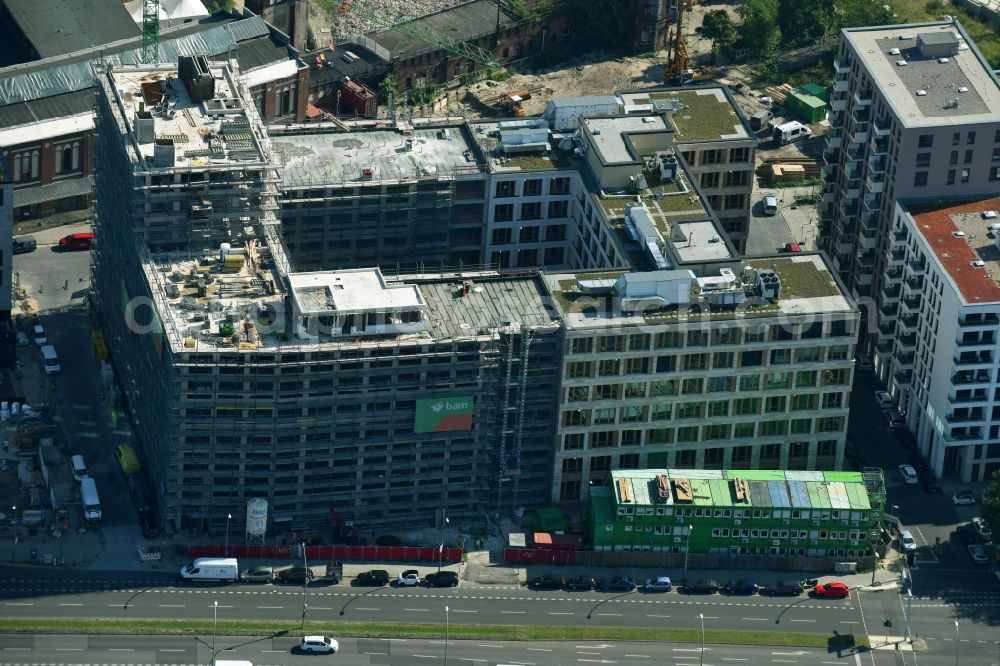 Berlin from above - Construction site to build a new office and commercial building durch die BAM Deutschland AG an der Muehlenstrasse - Am Postbahnhof destrict Friedrichshain in Berlin