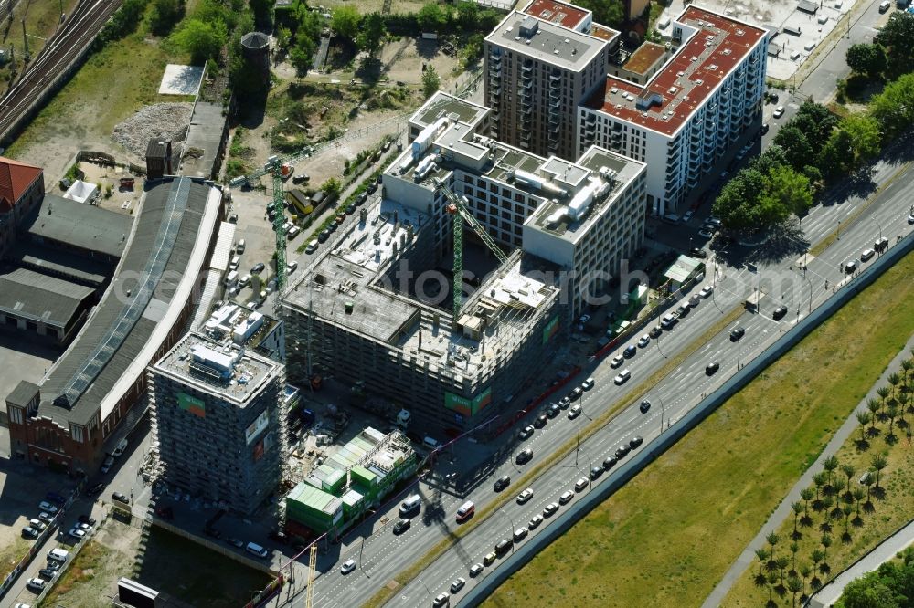 Berlin from above - Construction site to build a new office and commercial building durch die BAM Deutschland AG an der Muehlenstrasse - Am Postbahnhof destrict Friedrichshain in Berlin