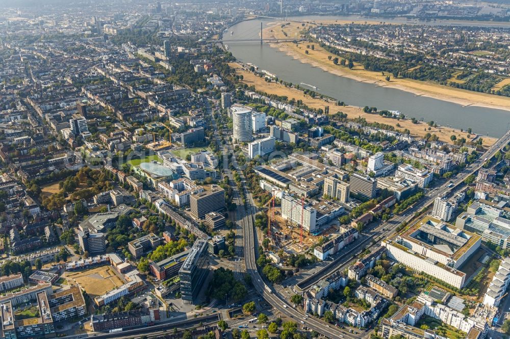 Düsseldorf from the bird's eye view: Construction site to build a new office and commercial building Eclipse at the Kennedydamm in Duesseldorf in the state North Rhine-Westphalia, Germany