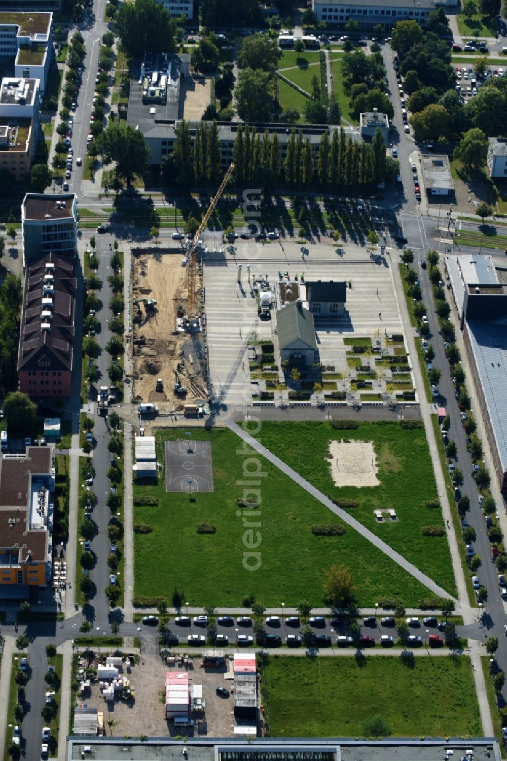 Berlin from above - Construction site to build a new office and commercial building along the Erich-Thilo-Strasse in Berlin, Germany