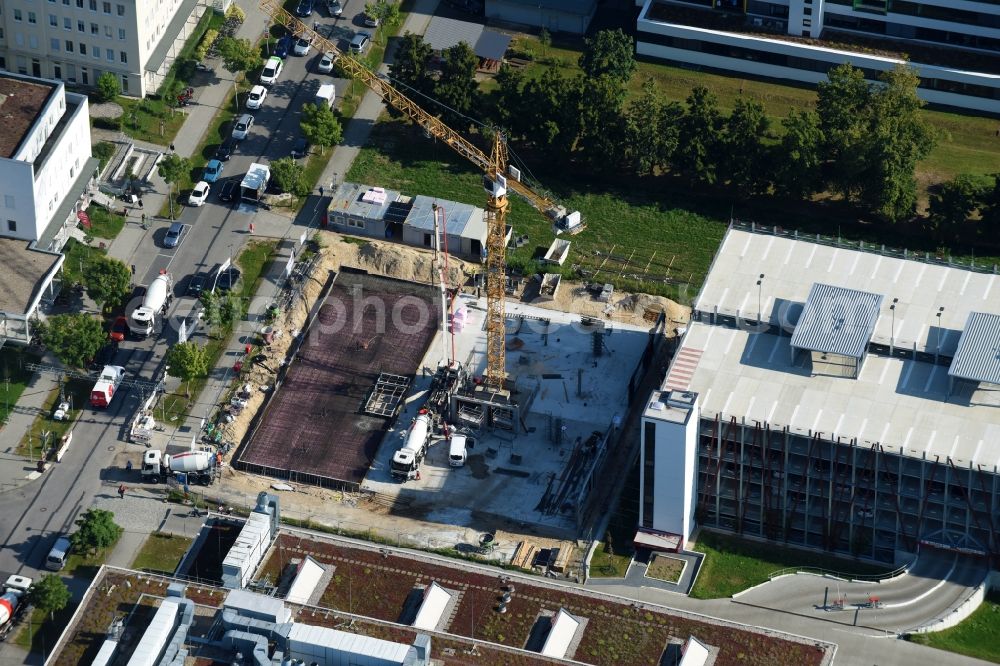 Berlin from above - Construction site to build a new office and commercial building EUROPA-CENTER Berlin Ecowiss through the Adolf Lupp GmbH + Co KG on Albert-Einstein-Strasse in the district Treptow-Koepenick in Berlin, Germany