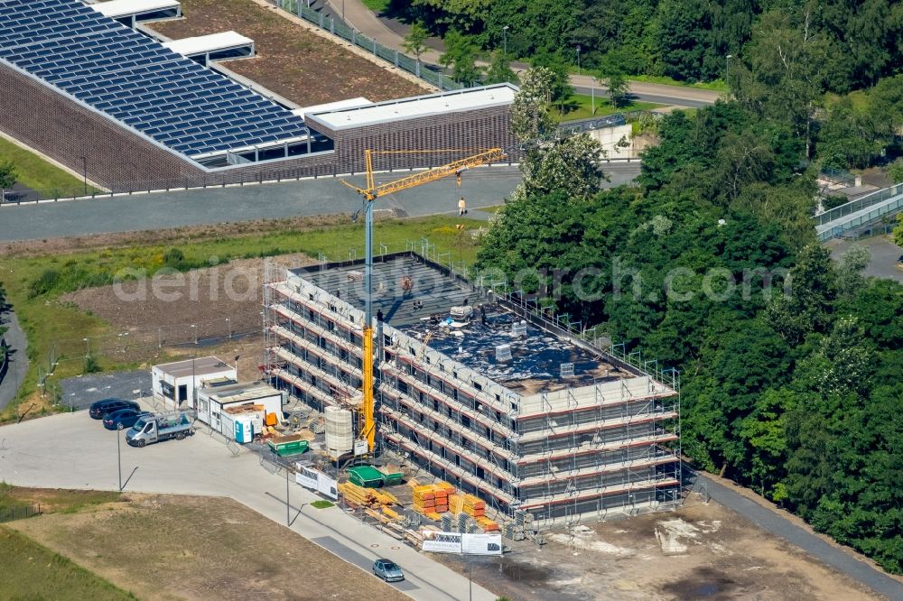 Bochum from the bird's eye view: Construction site to build a new office and commercial building on the site of the popular West Park in Bochum in North Rhine-Westphalia