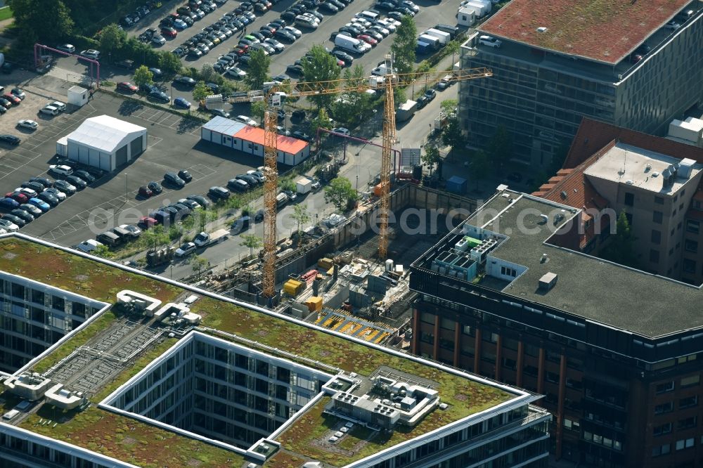 Aerial photograph Berlin - Construction site to build a new office and commercial building on Gutenbergstrasse corner Hannah-Karminski-Strasse in Berlin, Germany