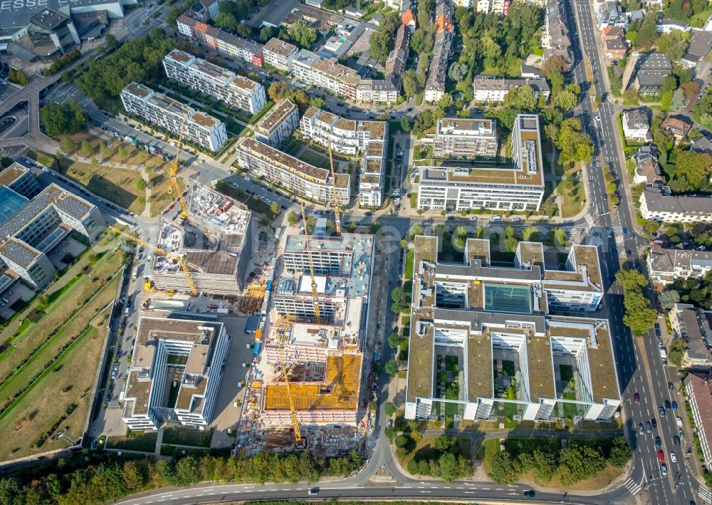 Essen from the bird's eye view: Construction site to build a new office and commercial building Messeallee - Luxemburger Strasse - Strassburger Strasse in Essen in the state North Rhine-Westphalia