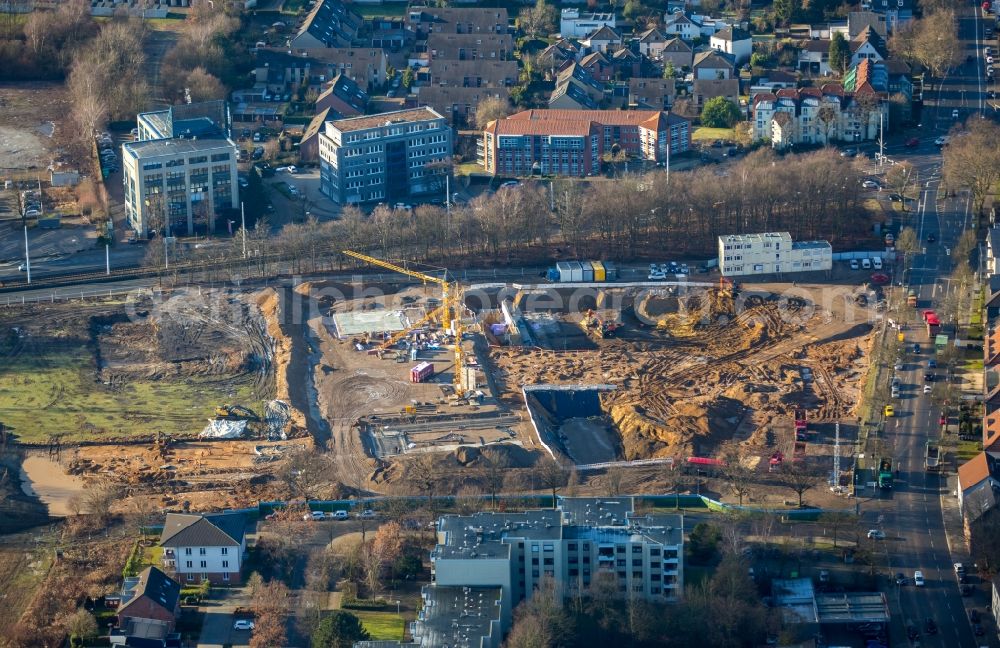 Aerial photograph Bochum - Building site to the new building of an office house and business house of the Vonovia headquarters in Bochum in the federal state North Rhine-Westphalia. The Vonovia SE belongs to the leading real estate enterprises in Europe and is the biggest Wolfgang Gerbere residential real estate company in Germany