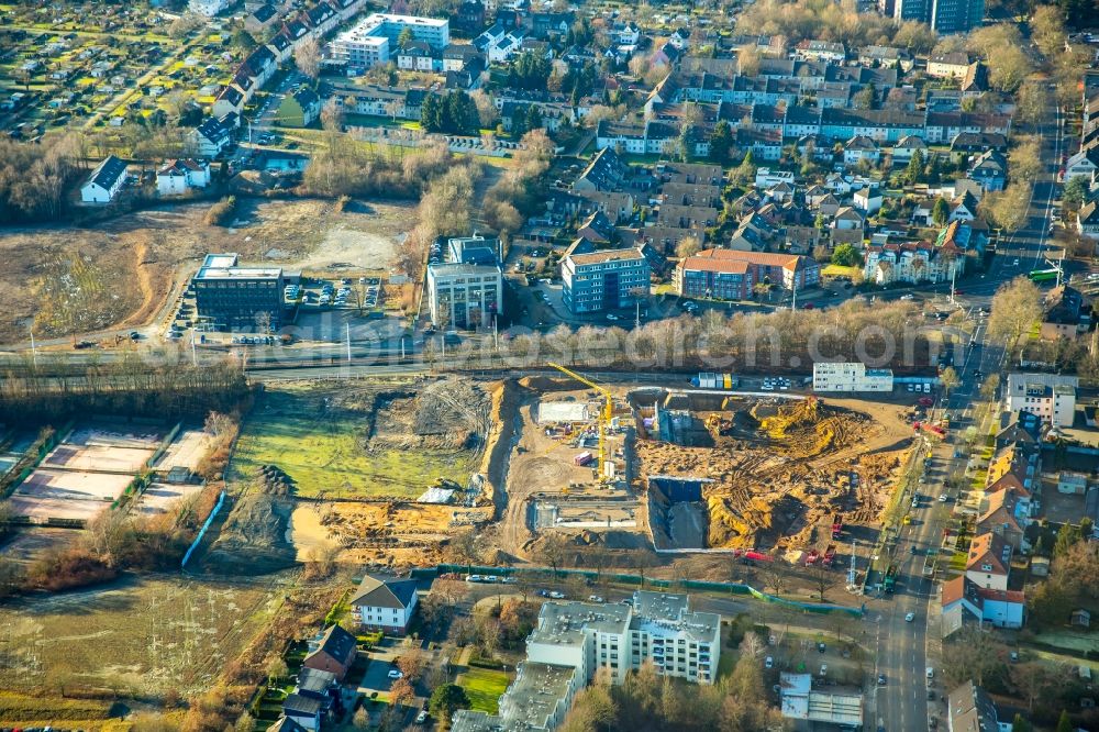 Bochum from the bird's eye view: Building site to the new building of an office house and business house of the Vonovia headquarters in Bochum in the federal state North Rhine-Westphalia. The Vonovia SE belongs to the leading real estate enterprises in Europe and is the biggest Wolfgang Gerbere residential real estate company in Germany