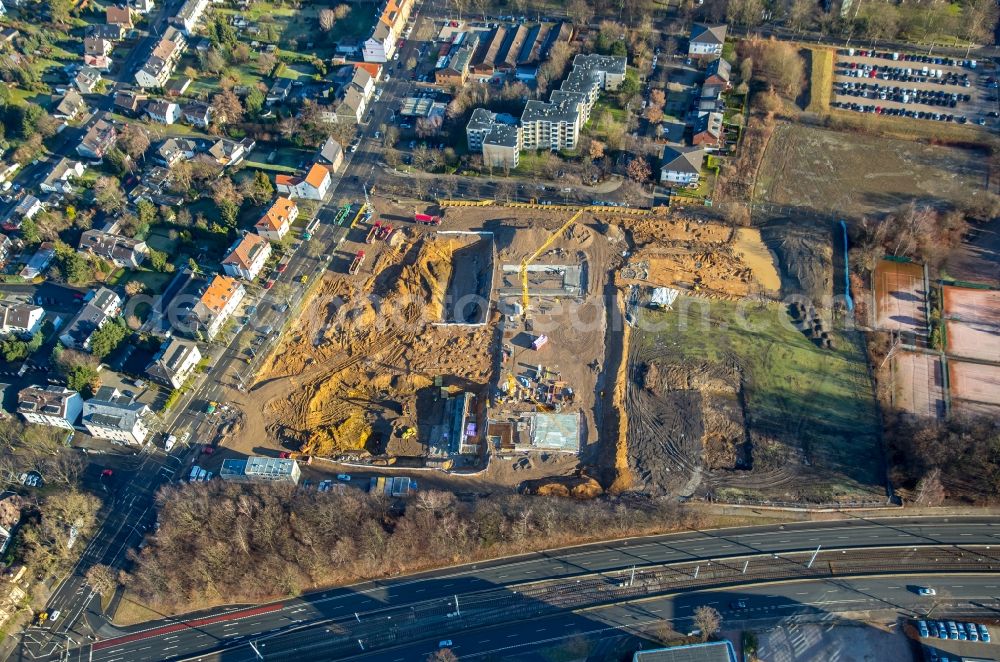 Aerial photograph Bochum - Building site to the new building of an office house and business house of the Vonovia headquarters in Bochum in the federal state North Rhine-Westphalia. The Vonovia SE belongs to the leading real estate enterprises in Europe and is the biggest Wolfgang Gerbere residential real estate company in Germany