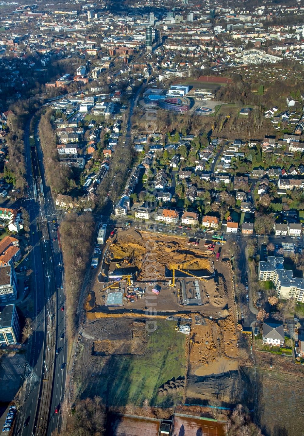 Aerial photograph Bochum - Building site to the new building of an office house and business house of the Vonovia headquarters in Bochum in the federal state North Rhine-Westphalia. The Vonovia SE belongs to the leading real estate enterprises in Europe and is the biggest Wolfgang Gerbere residential real estate company in Germany