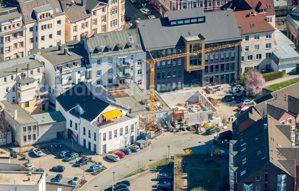 Hagen from above - Construction site to build a new office and commercial building of Wulff Bau-GmbH & Co. KG on Huettenplatz in the district Haspe in Hagen in the state North Rhine-Westphalia