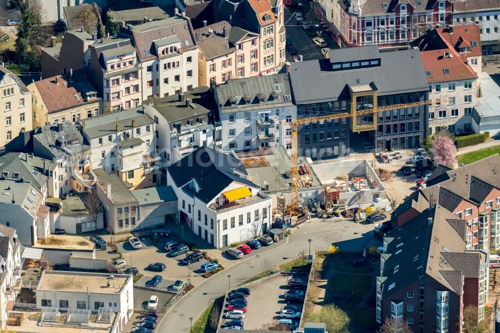 Hagen from the bird's eye view: Construction site to build a new office and commercial building of Wulff Bau-GmbH & Co. KG on Huettenplatz in the district Haspe in Hagen in the state North Rhine-Westphalia