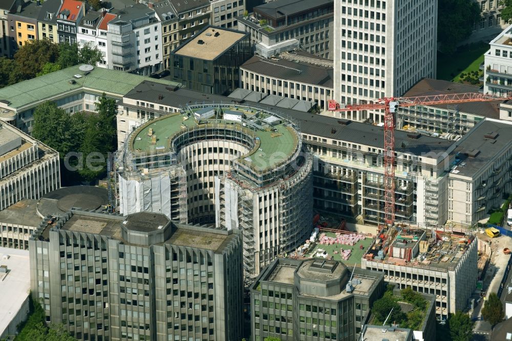 Köln from the bird's eye view: Construction site to build a new office and commercial building to the Revitalization and restoration monument - office buildings rotunda GQ1 and GQ23 Im Klapperhof in Cologne in the state North Rhine-Westphalia, Germany