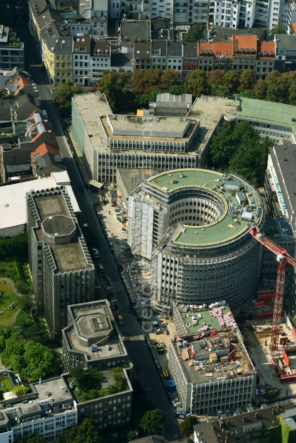 Köln from above - Construction site to build a new office and commercial building to the Revitalization and restoration monument - office buildings rotunda GQ1 and GQ23 Im Klapperhof in Cologne in the state North Rhine-Westphalia, Germany