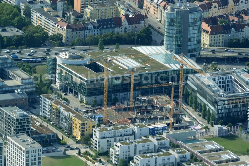 München from above - Construction site for the new office- building NOVE Arnulfpark in Munich in the state Bavaria. On the last gap in Munich's Arnulfpark built the HORUS Development GmbH, a project company of the Art-Invest Real Estate and Consulting SALVIS by the project planner Antonio Citterio Patricia Viel and Partners with the Porr Germany GmbH a modern office building