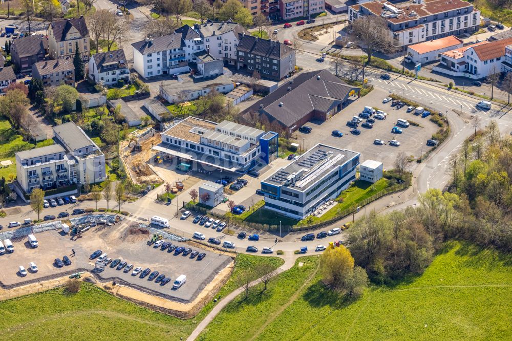 Witten from the bird's eye view: Construction site of a new office building complex next to the Netto supermarket branch on Rosi-Wolfstein-Strasse in the Annen part of Witten in the state of North Rhine-Westphalia