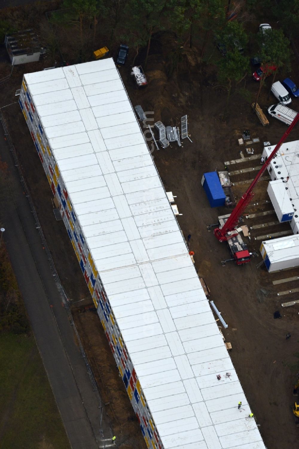 Aerial photograph Berlin - Construction site for the new construction container village for refugees in Berlin Koepenick