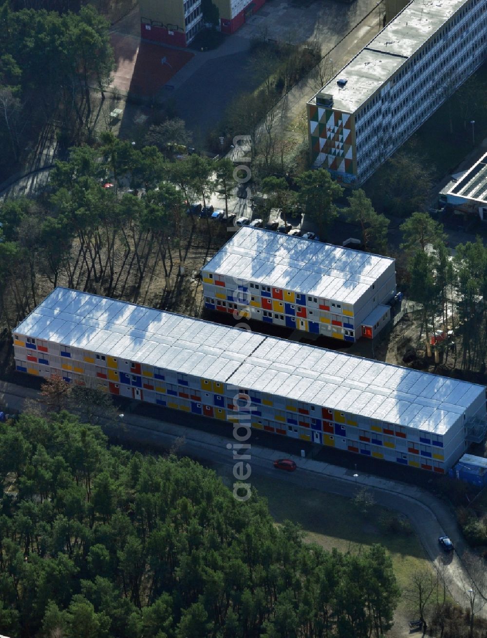 Aerial image Berlin - Construction site for the new construction container village for refugees in Berlin Koepenick