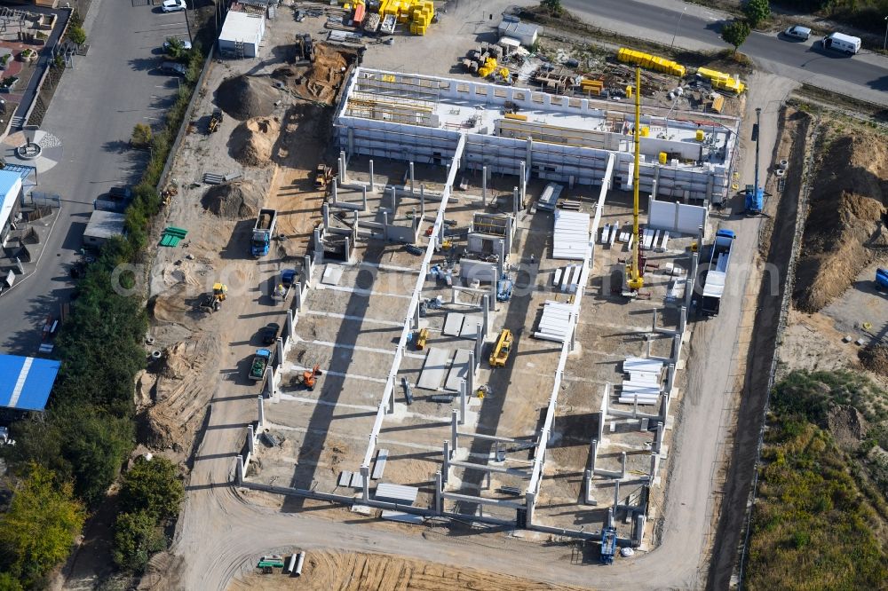 Bernau from the bird's eye view: Construction site for the new building Dictator Produktionsstaette Pappelallee Bernau in the district Schoenow in Bernau in the state Brandenburg, Germany