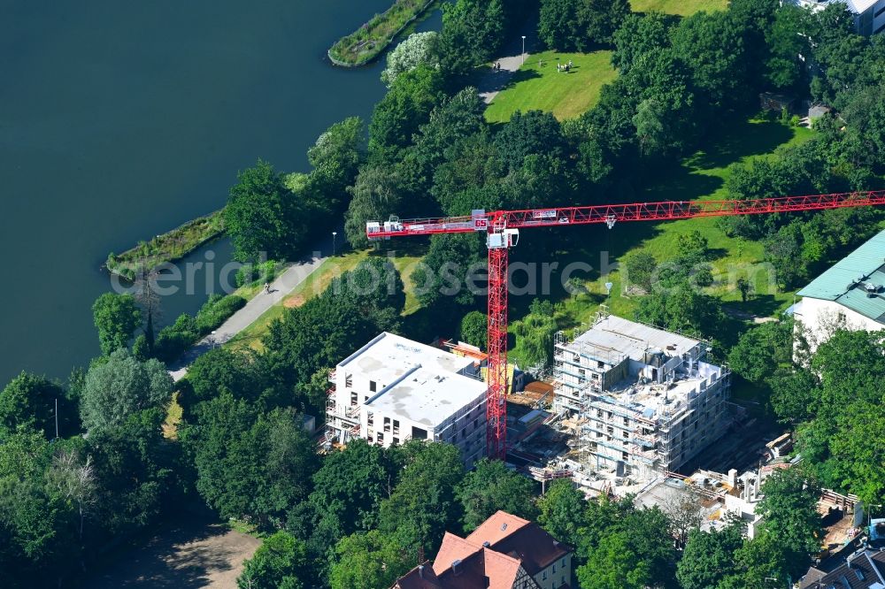 Nürnberg from the bird's eye view: Construction site for the multi-family residential building in of Veilhofstrasse in the district Veilhof in Nuremberg in the state Bavaria, Germany