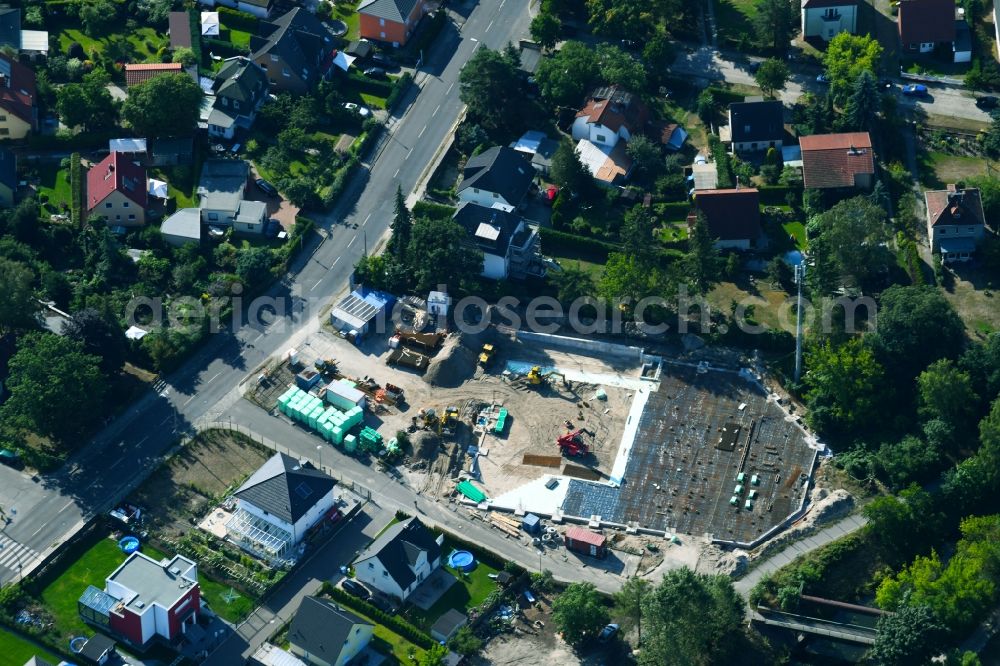 Aerial image Berlin - New construction of the building complex of the shopping center Bismarcksfelderstrasse corner Kaulsdorfer Strasse in Berlin, Germany