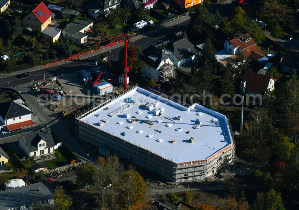 Berlin from the bird's eye view: New construction of the building complex of the shopping center Bismarcksfelderstrasse corner Kaulsdorfer Strasse in Berlin, Germany