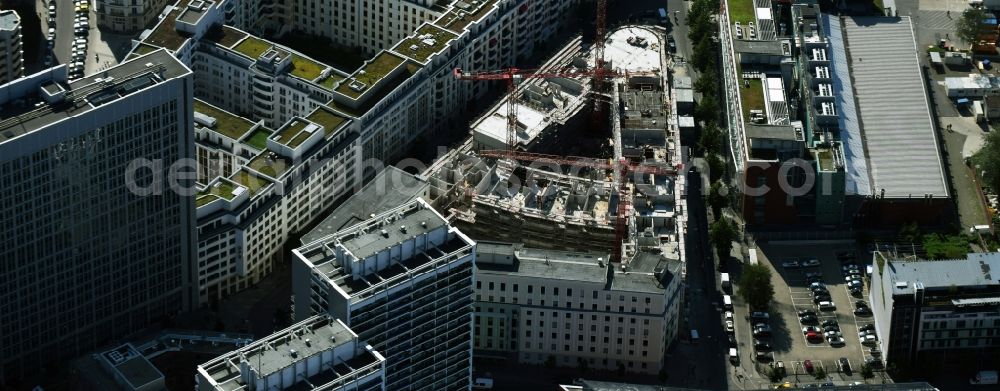 Aerial image Berlin - Construction for the new construction of condominiums and commercial units of the project Living at Spittelmarkt by the construction company Adolf Lupp GmbH + Co KG on the triangular plot around the Kommandantenstrasse and Beuthstrasse in the district Mitte in Berlin, Germany. The client is the PANDION AG