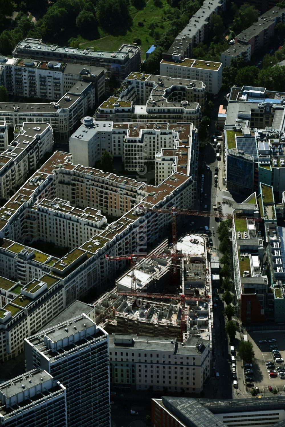 Berlin from above - Construction for the new construction of condominiums and commercial units of the project Living at Spittelmarkt by the construction company Adolf Lupp GmbH + Co KG on the triangular plot around the Kommandantenstrasse and Beuthstrasse in the district Mitte in Berlin, Germany. The client is the PANDION AG