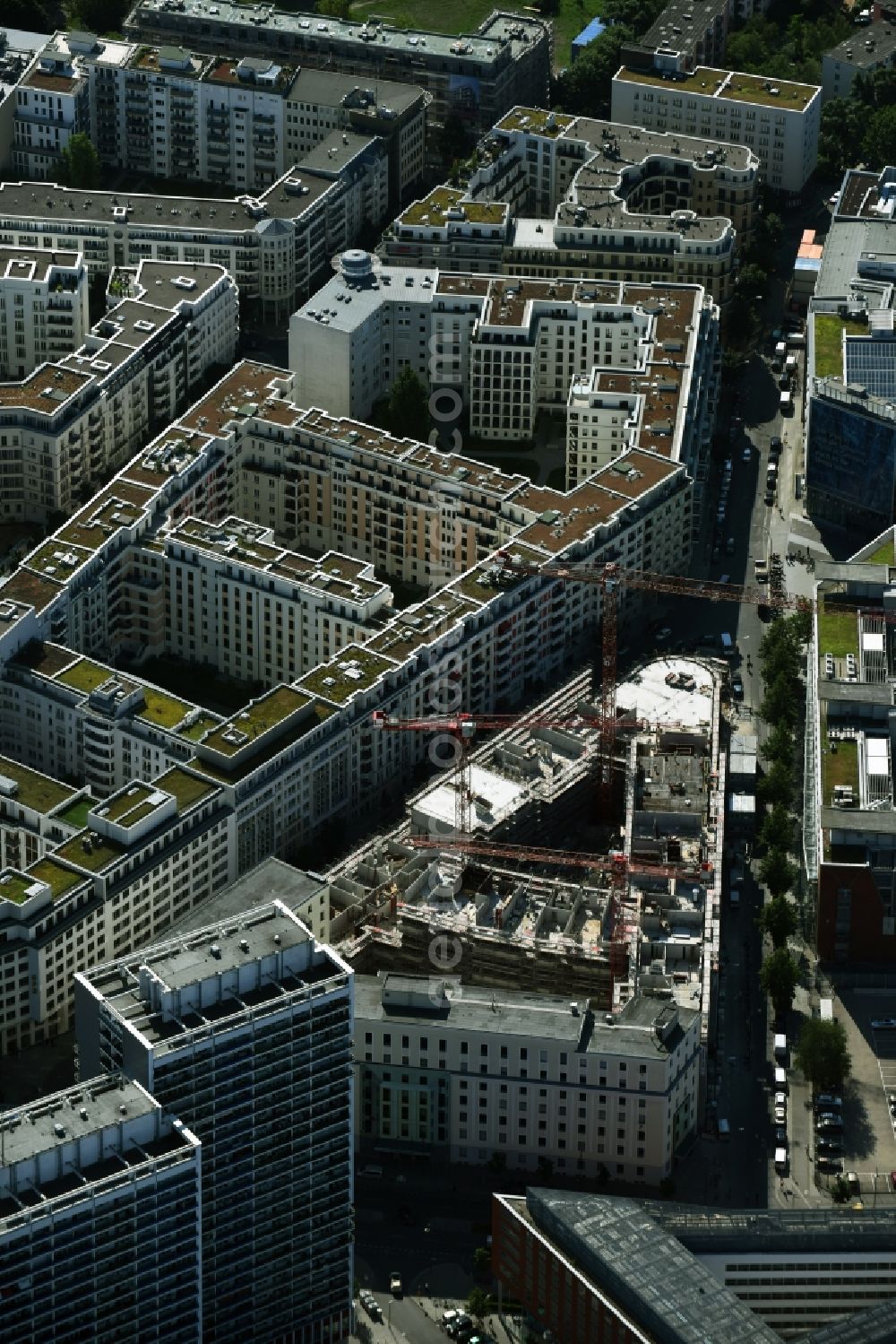 Aerial image Berlin - Construction for the new construction of condominiums and commercial units of the project Living at Spittelmarkt by the construction company Adolf Lupp GmbH + Co KG on the triangular plot around the Kommandantenstrasse and Beuthstrasse in the district Mitte in Berlin, Germany. The client is the PANDION AG