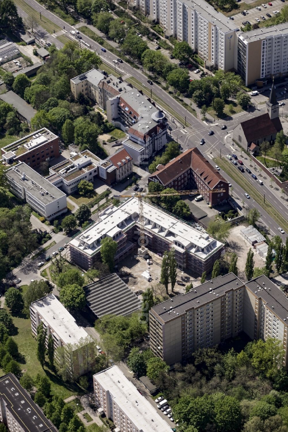 Berlin from above - Construction site of a new DOMICIL care and nursing home for the elderly on Alfred-Kowalke-Strasse in the district of Lichtenberg in Berlin, Germany. Its owner is HBB Hanseatische Gesellschaft fuer Seniorenheime mbH & Co. KG, BATEG GmbH is the main developer